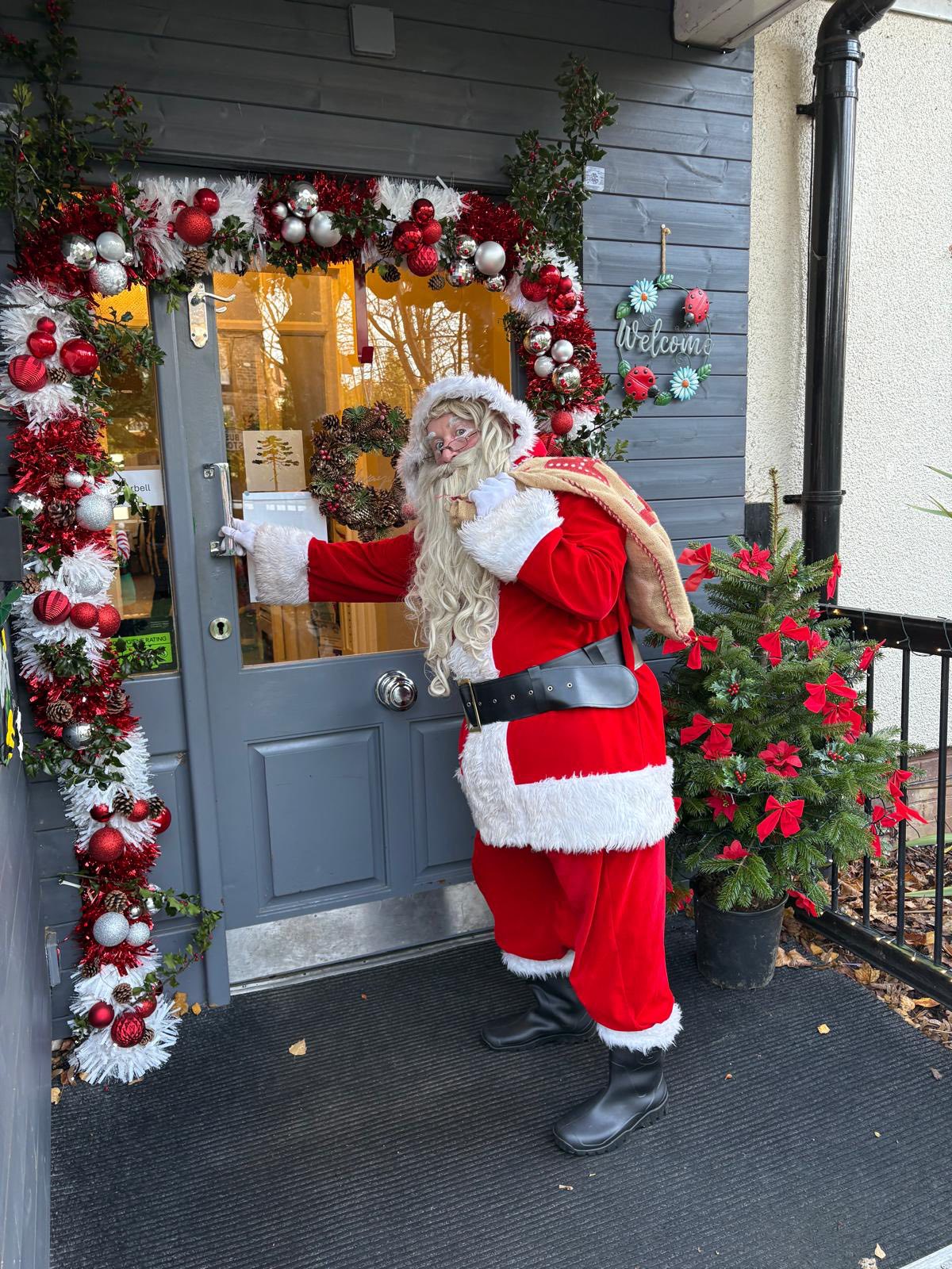 Santa Claus arriving at Twelve Trees care home for Christmas 2025 celebration