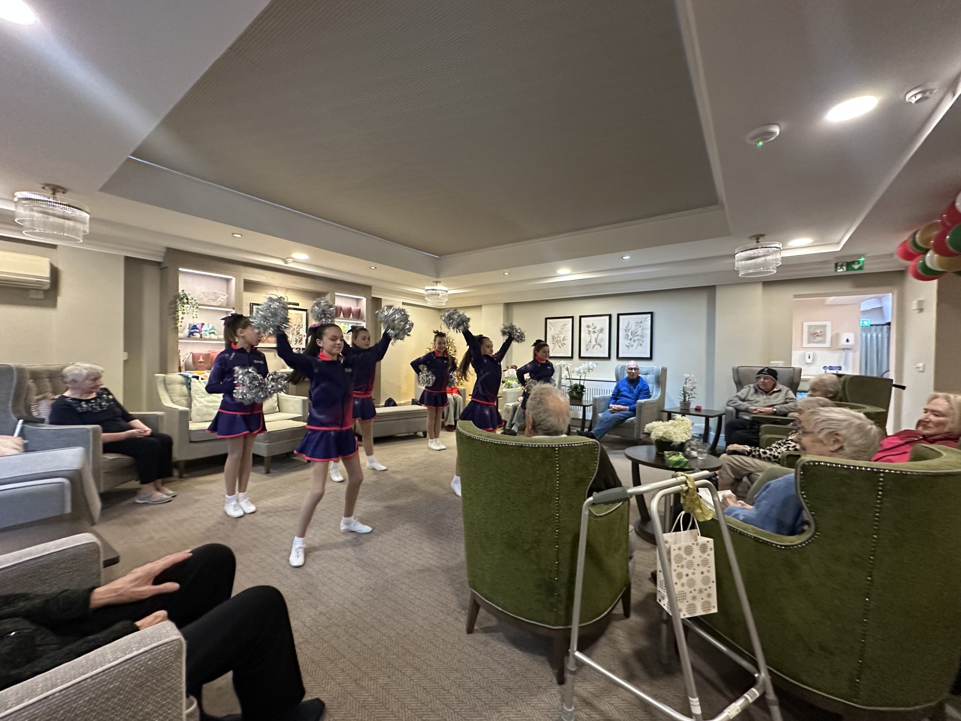 Cheerleaders performing at Meadowbrook Manor Christmas