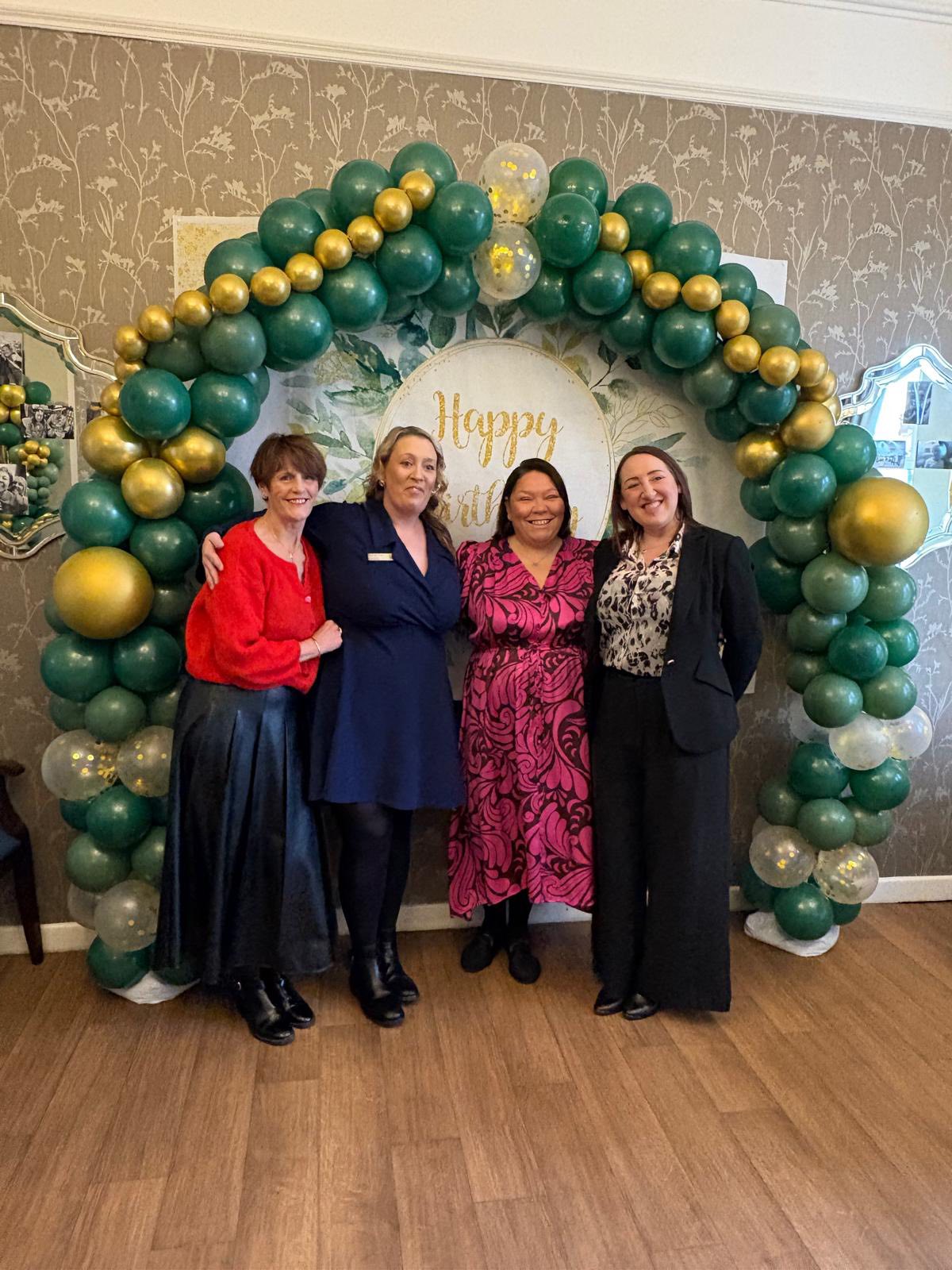 Proud staff members celebrating 30 years of dedicated care service at Twelve Trees Sheffield