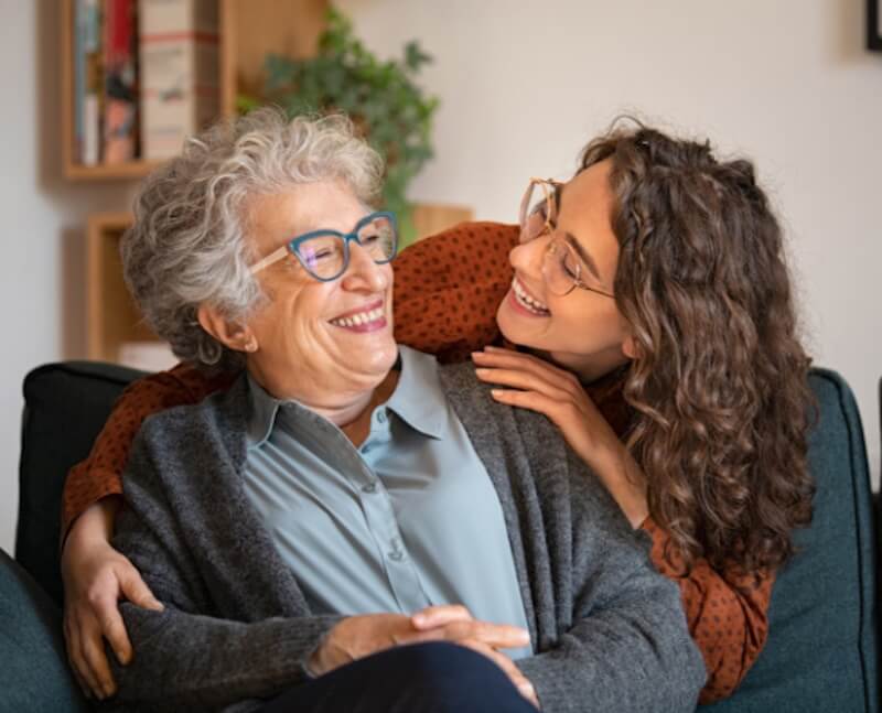 Family member visiting their mother receiving home care from Twelve Trees in Sheffield