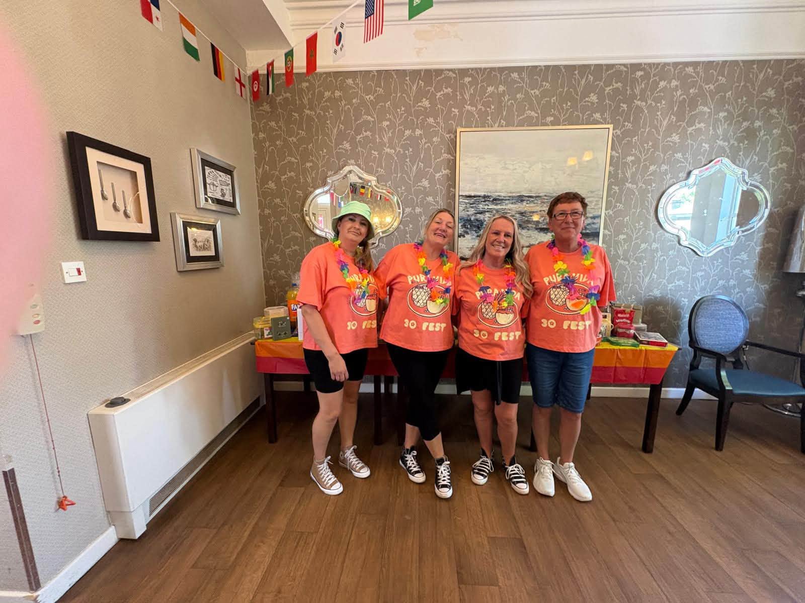 Twelve Trees Care Home staff enjoying the 30th anniversary celebrations together