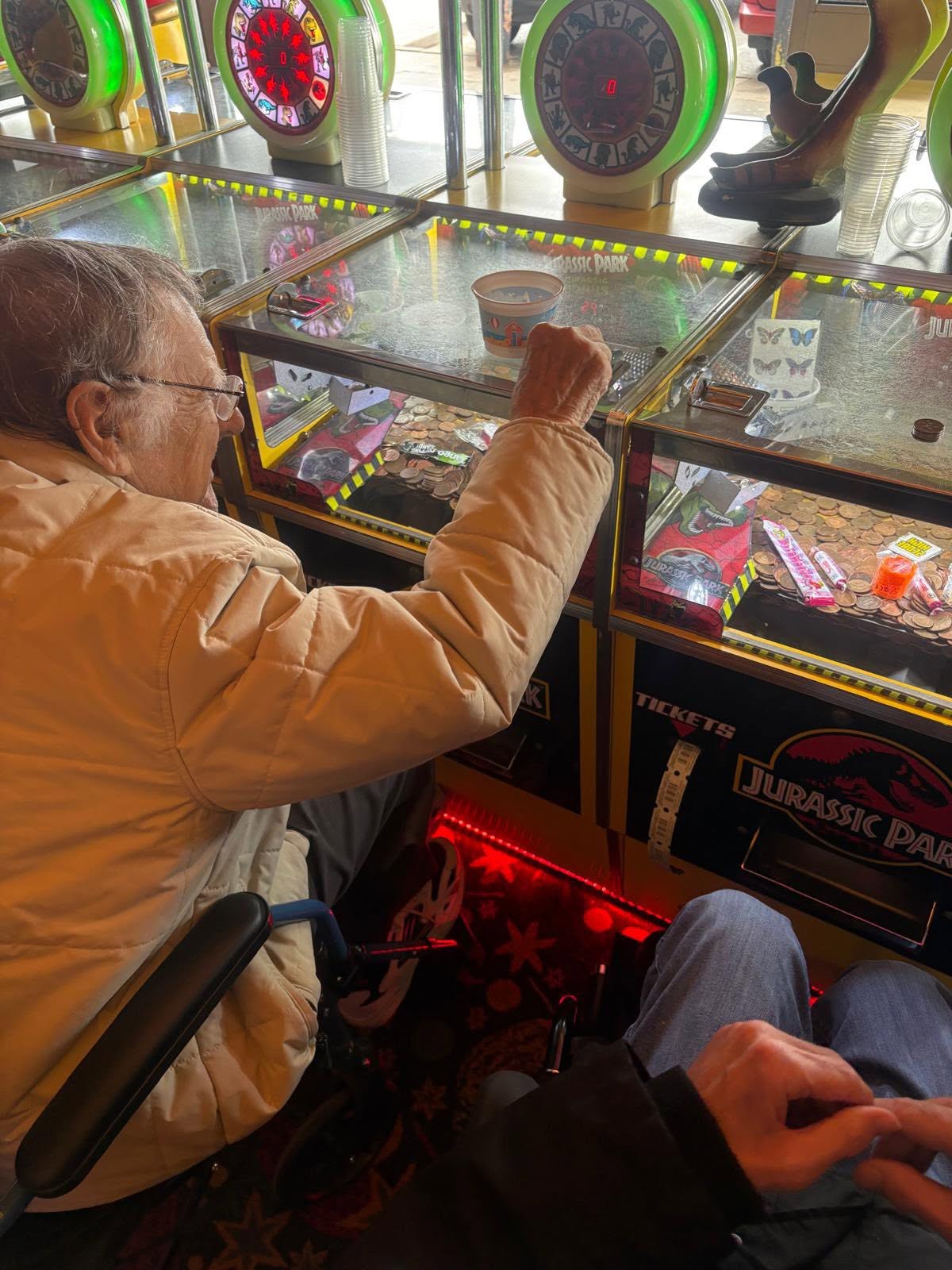 You are never too old for a game on the slot machines at the seaside arcade