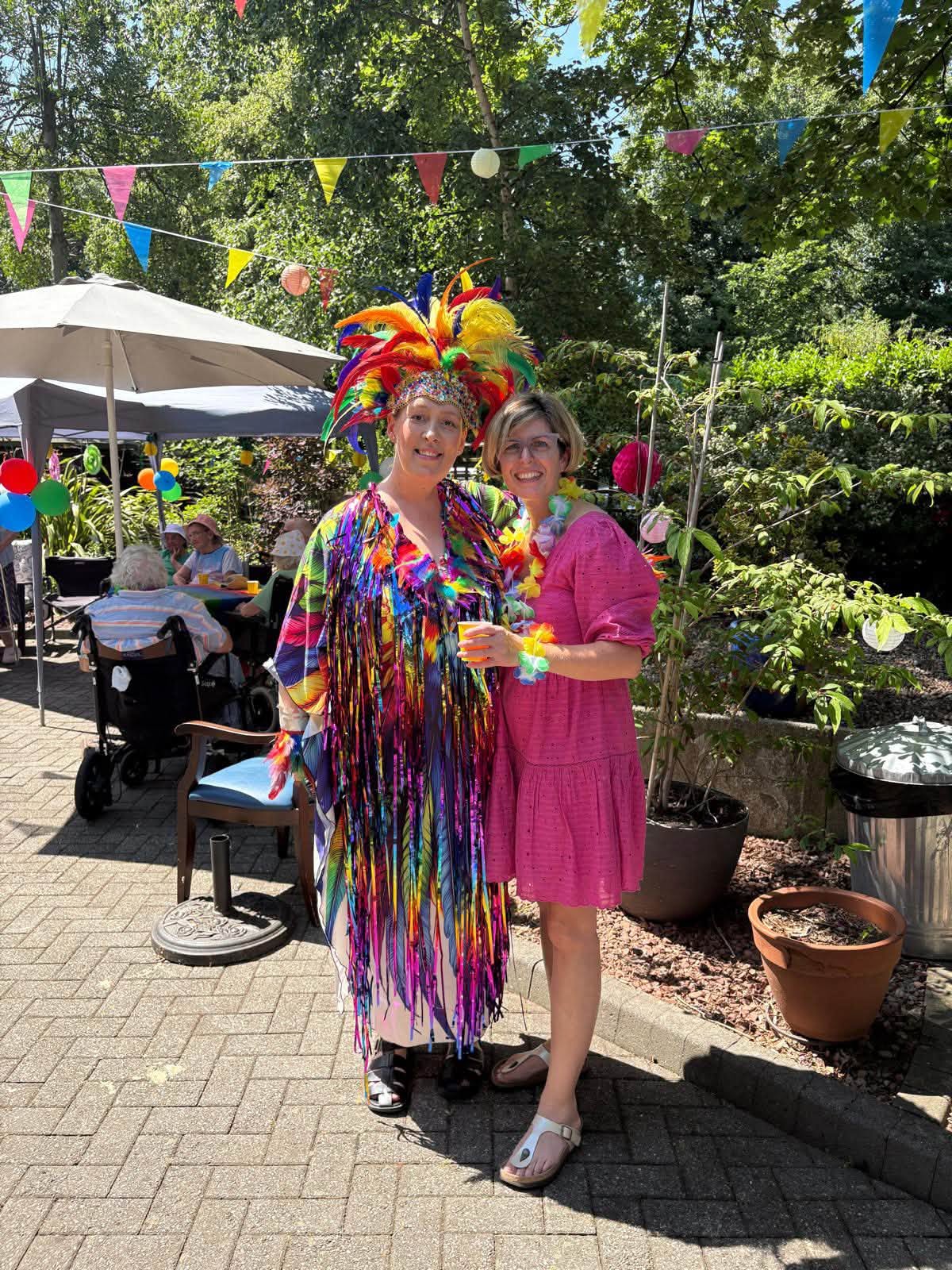 Guests enjoying the 30th anniversary Caribbean summer fayre at Twelve Trees Care Home Sheffield