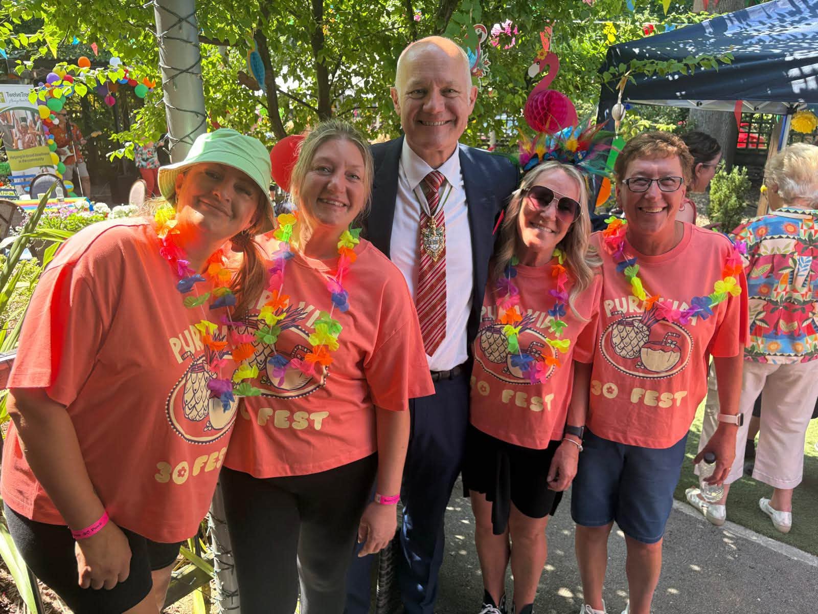 Twelve Trees Care Home staff celebrating 30 years alongside the Sheffield Master Cutler