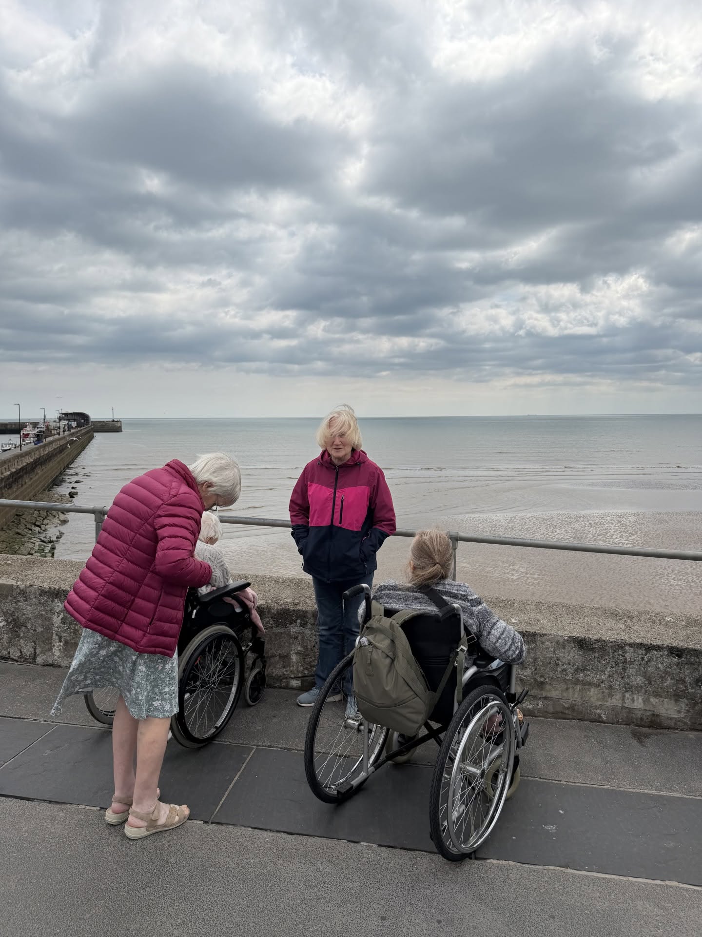 Meadowbrook Manor residents enjoying the promenade at Bridlington on a day out