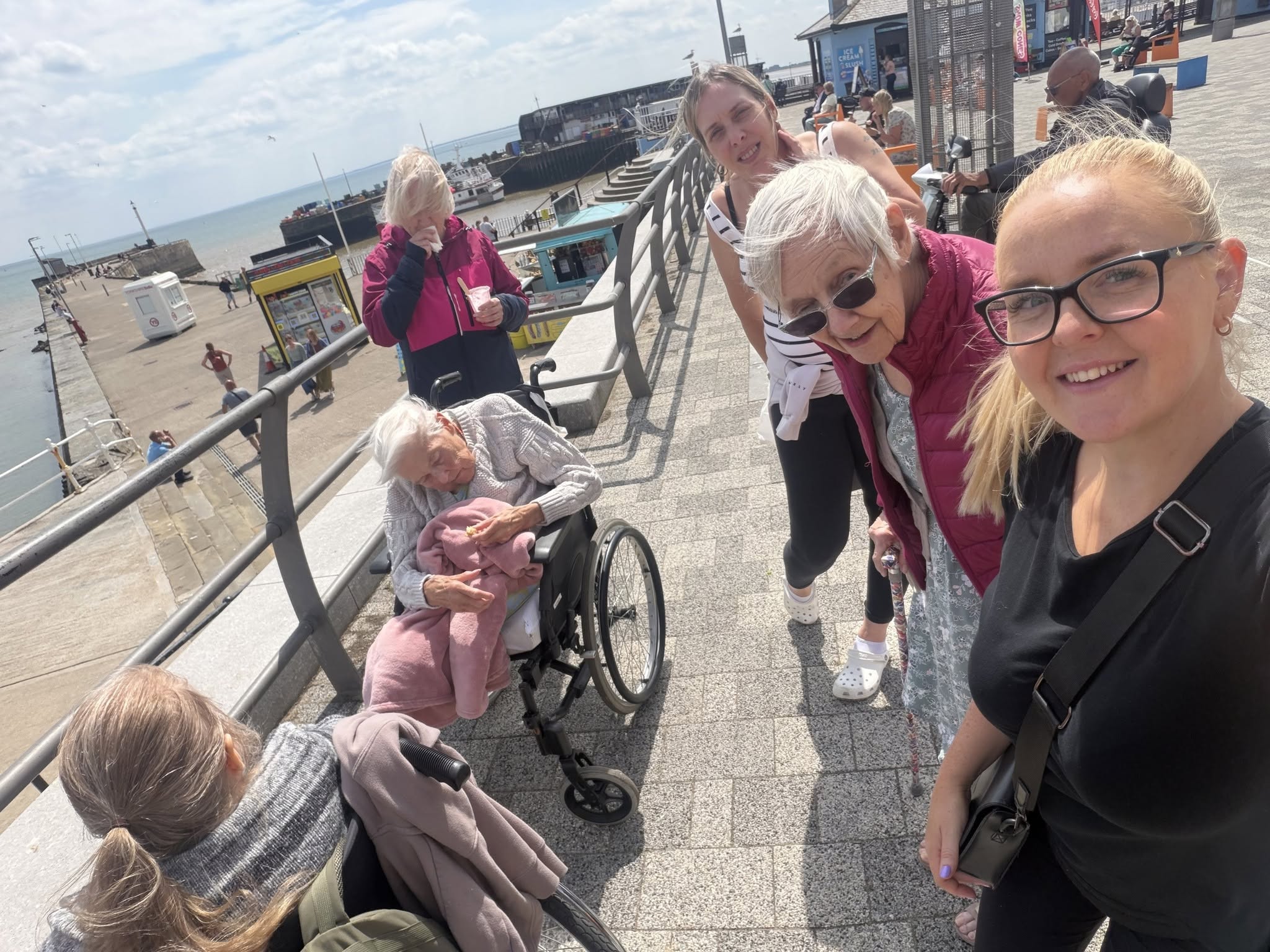 Twelve Trees Care residents and staff getting some sea air and enjoying an ice cream at the seaside